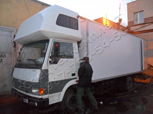 Автофургон ТАТА-613 ( АМУР ) с надкрышным спальником
